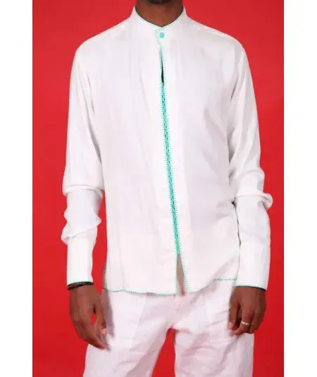 White tunic with green stitching